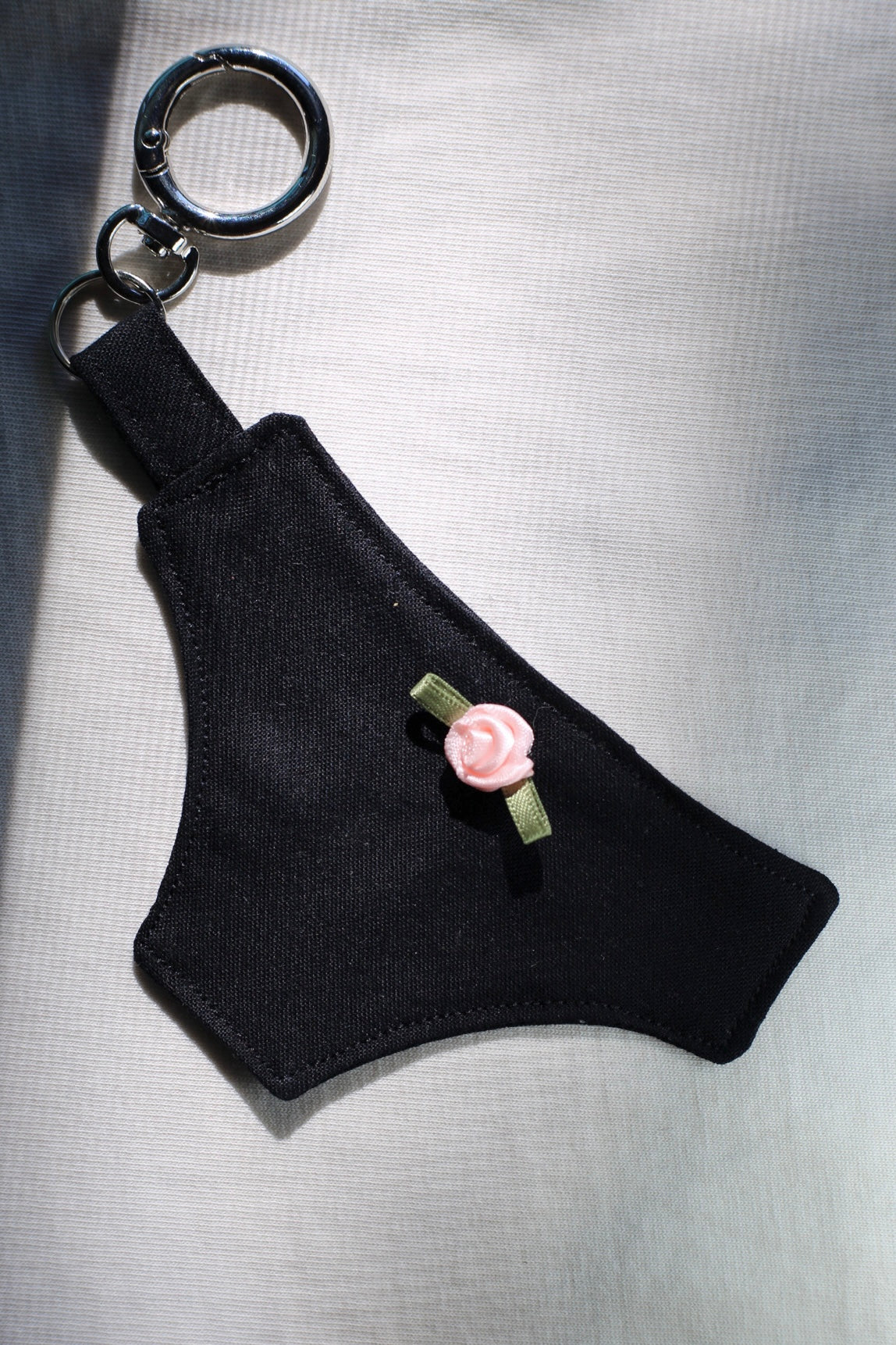 Human rights: cheeky bag charm