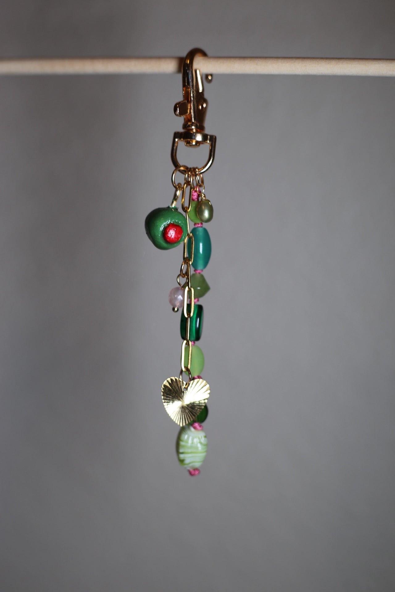 ‘Tini olive bag charm