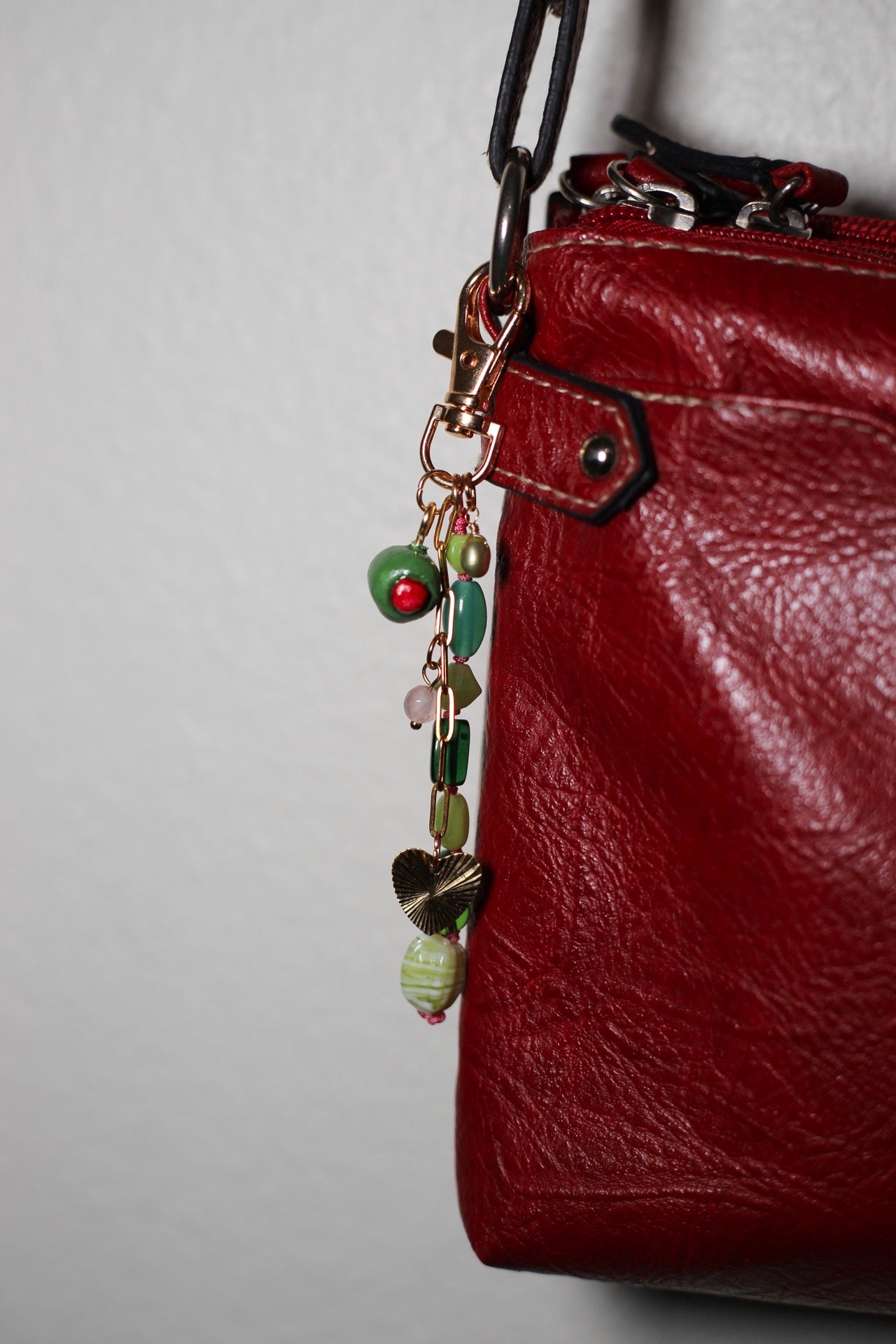 ‘Tini olive bag charm
