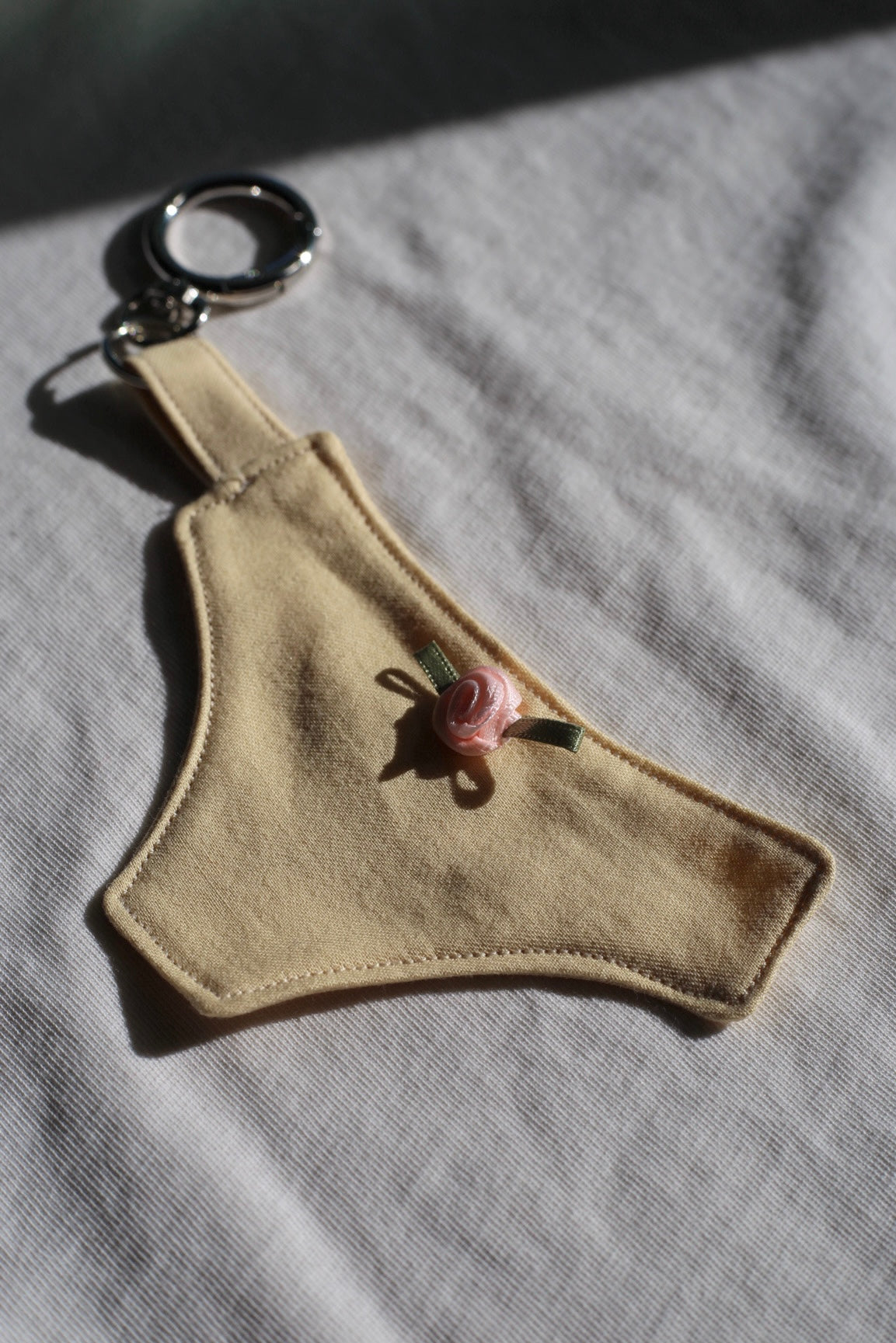 Human rights: cheeky bag charm
