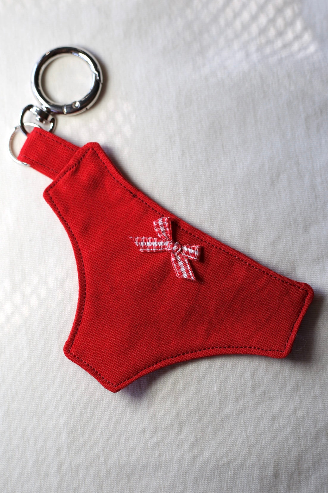 Human rights: cheeky bag charm