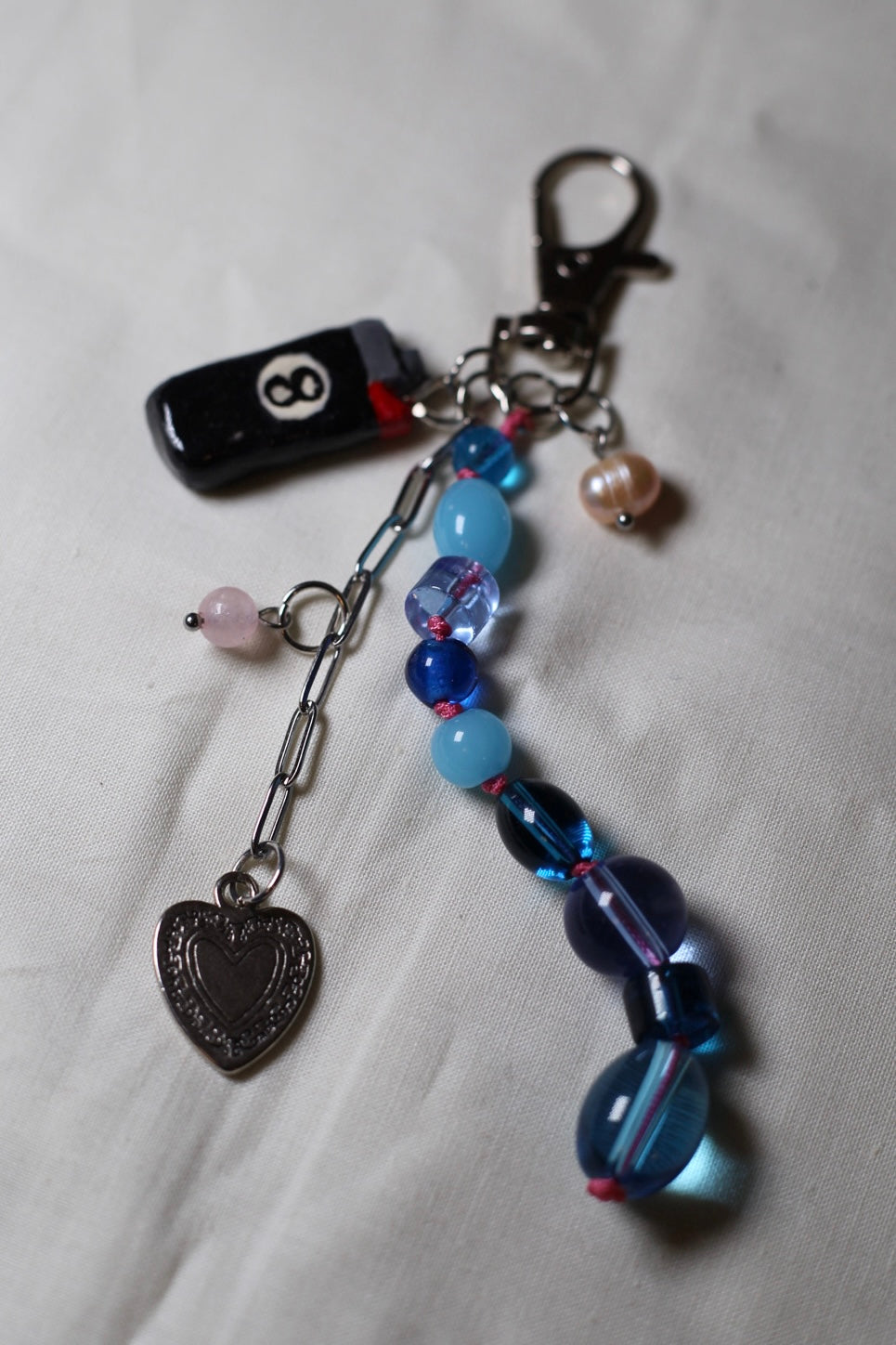 It’s lit bag charm