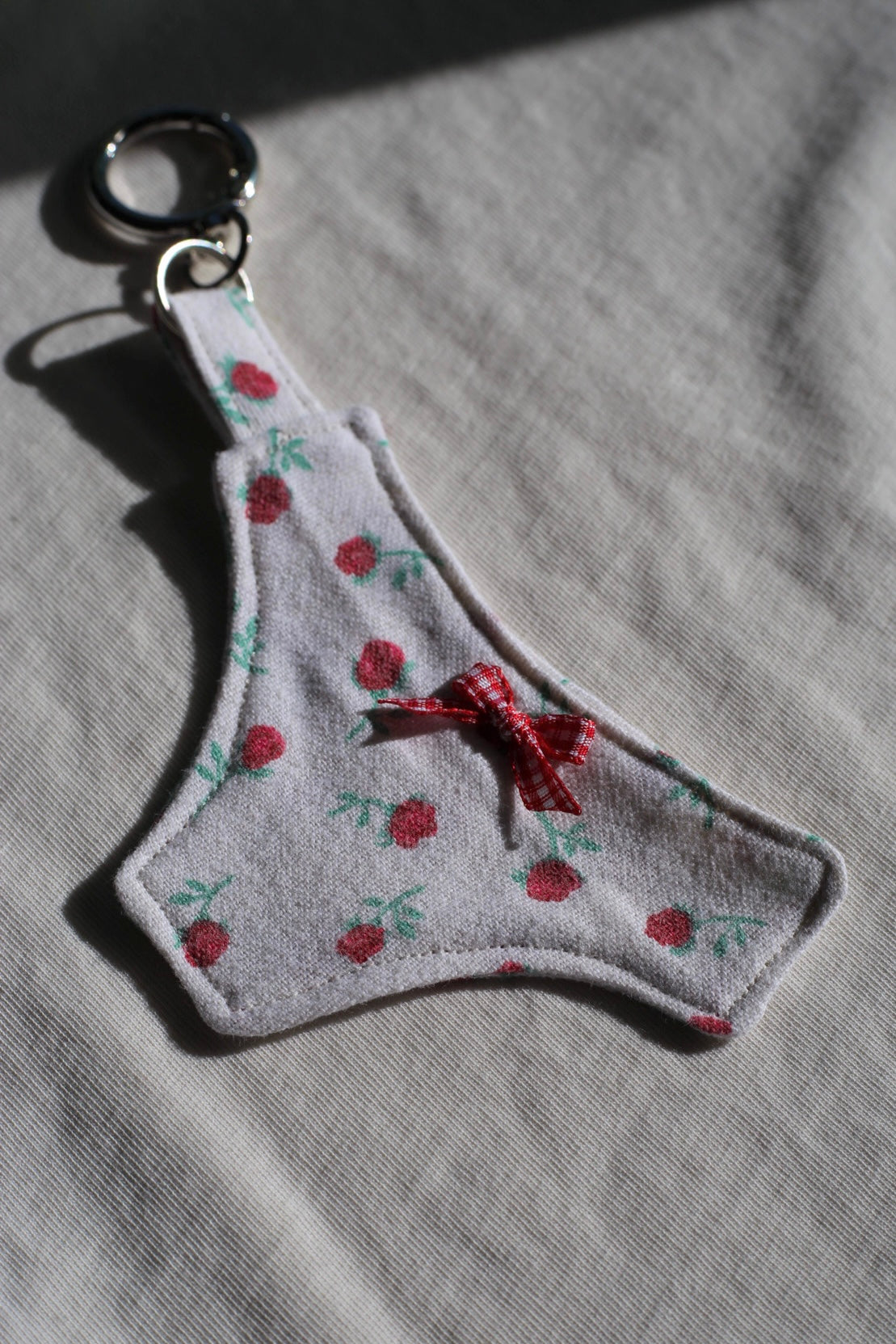 Human rights: cheeky bag charm