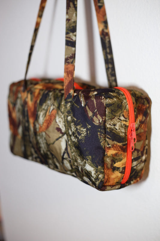 Human rights: Camo bowler bag