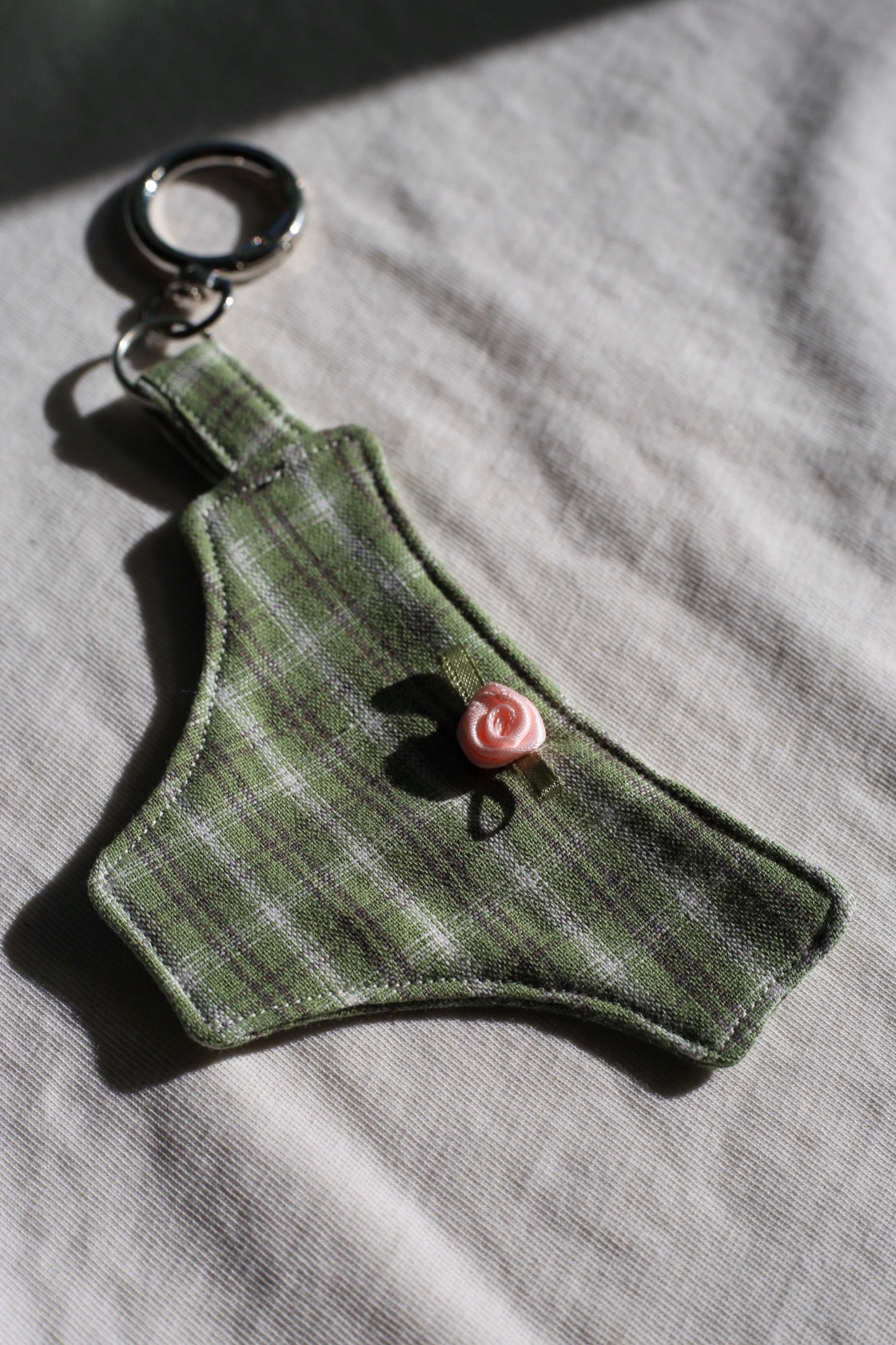 Human rights: cheeky bag charm